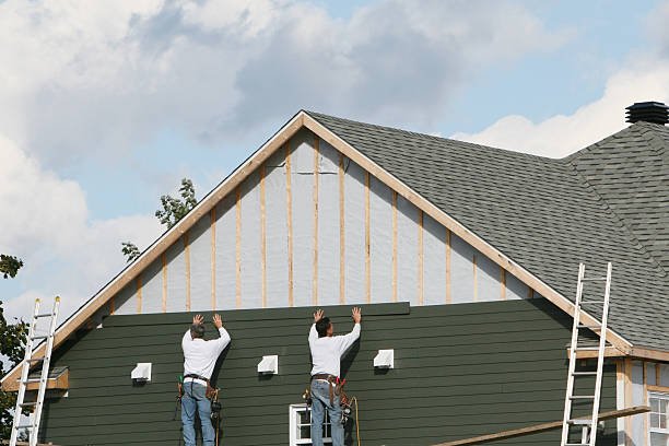 Professional Siding Replacement technician working in Needham Heights, MA